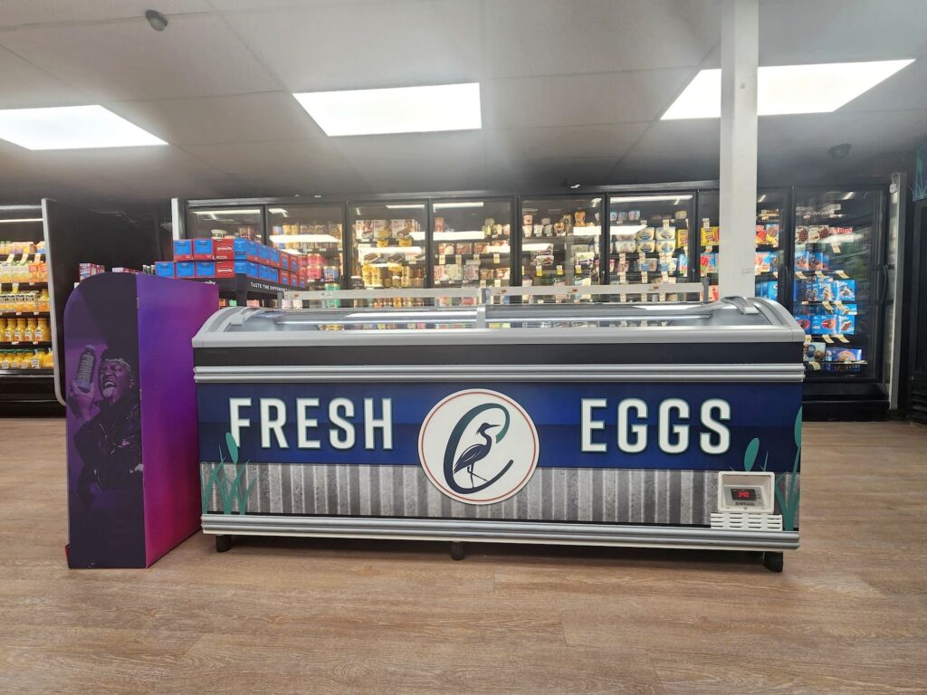A refrigerated case labeled 