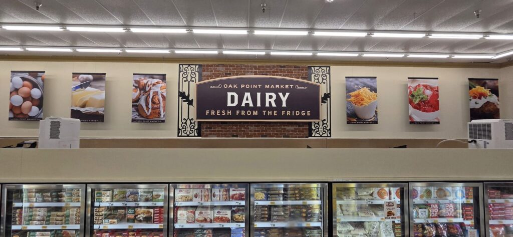 A sign in the dairy section reads 