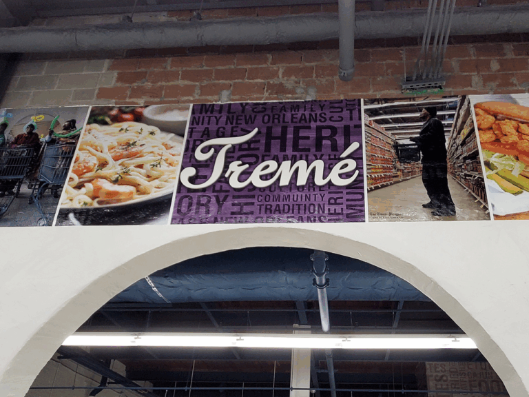 Wall collage above an arch features 